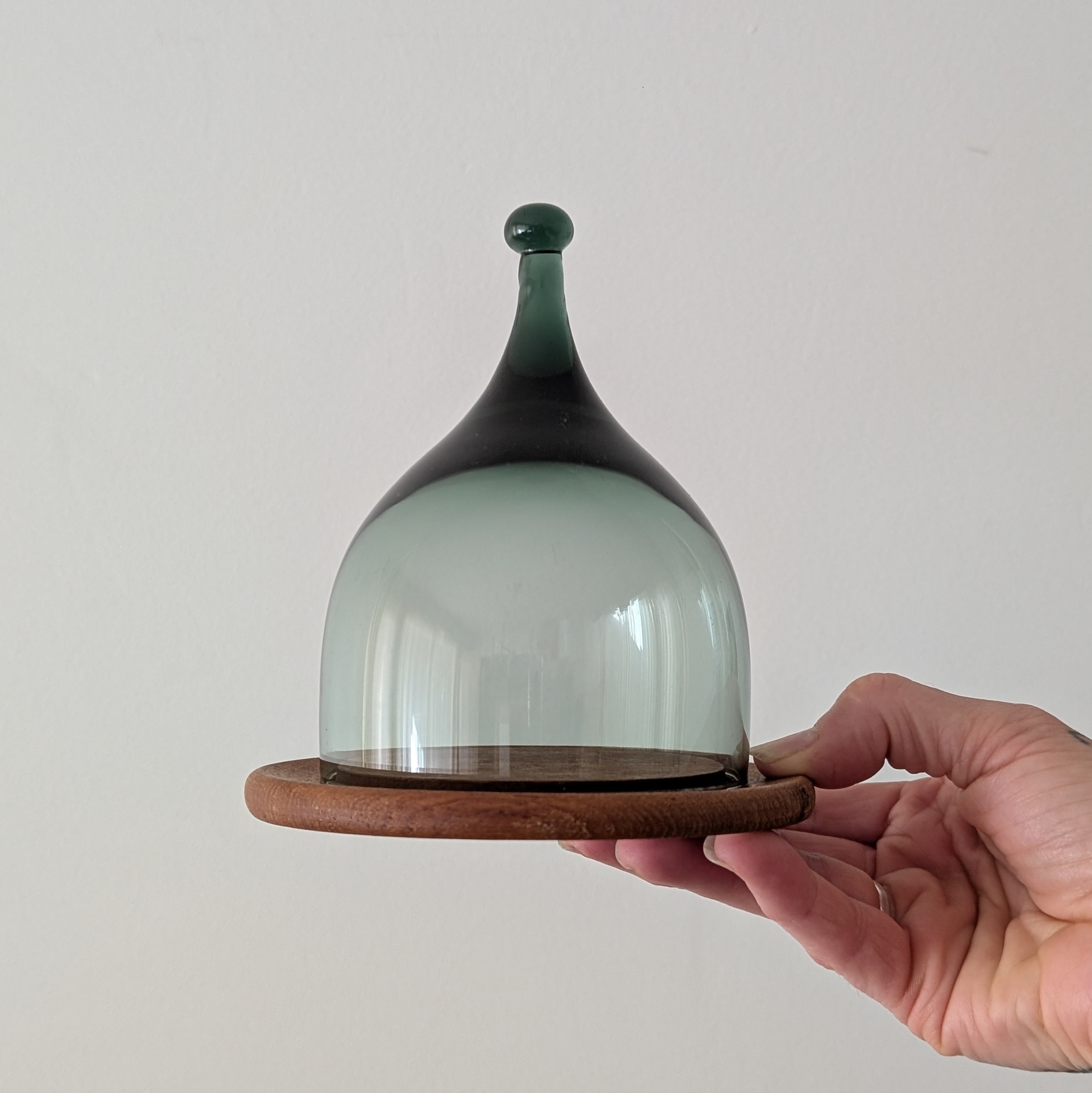 Vintage glass cloche on wood base